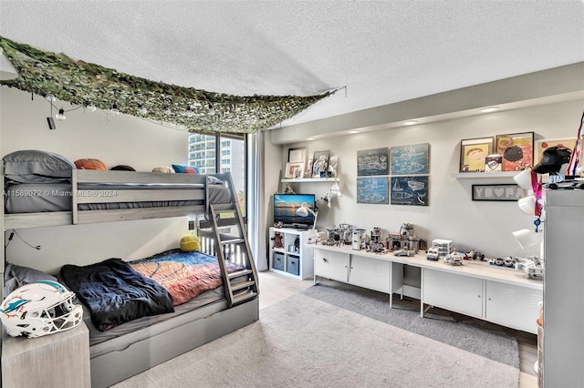 bedroom featuring a textured ceiling