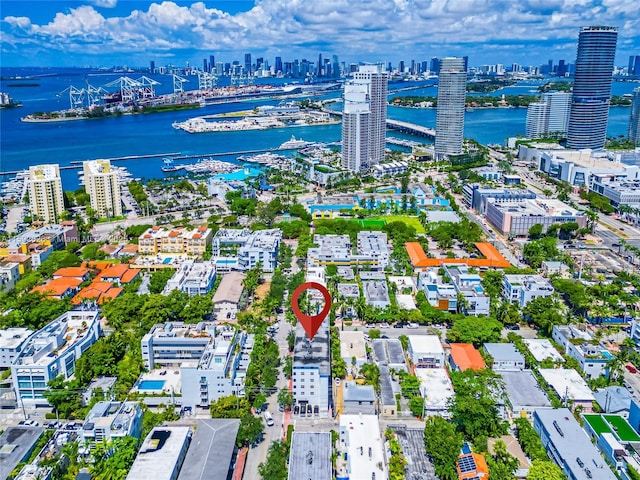 birds eye view of property featuring a water view