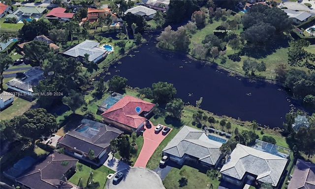 drone / aerial view with a water view