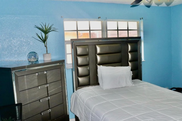 bedroom featuring ceiling fan