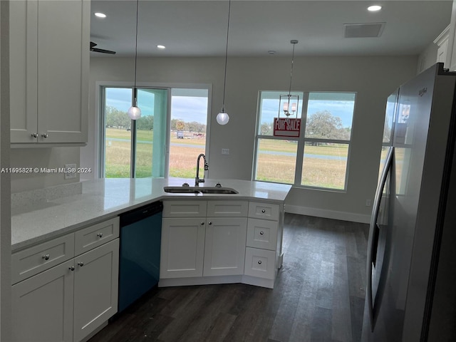 kitchen with dishwasher, sink, dark hardwood / wood-style flooring, stainless steel fridge, and white cabinets