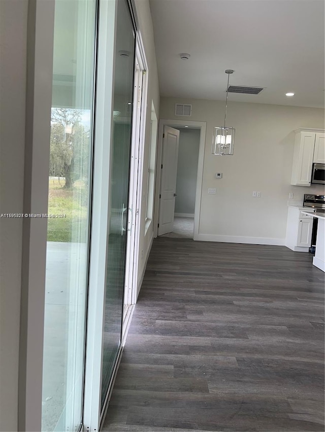 hall featuring dark hardwood / wood-style floors