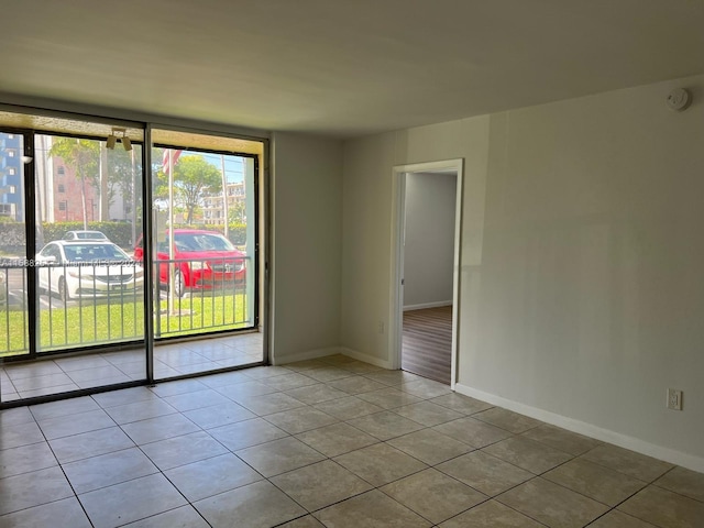 view of tiled spare room