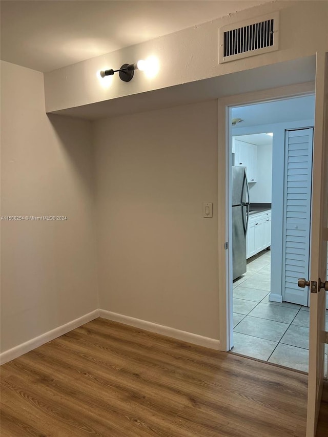 empty room featuring light hardwood / wood-style floors