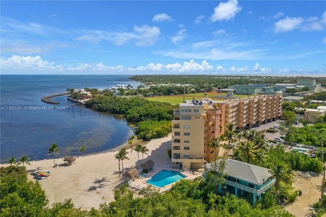 drone / aerial view with a water view