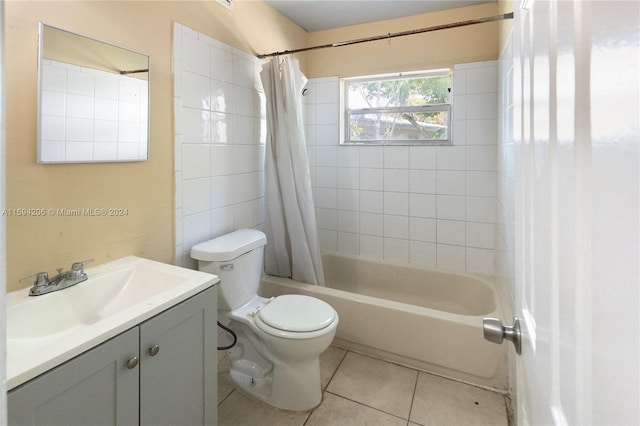 full bathroom featuring toilet, vanity, tile patterned floors, and shower / bathtub combination with curtain