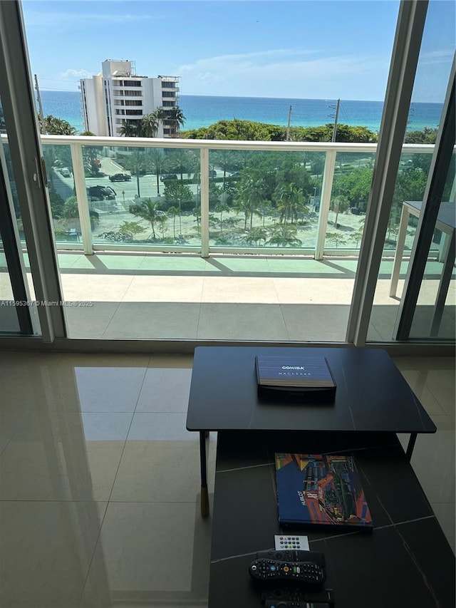 balcony featuring a water view