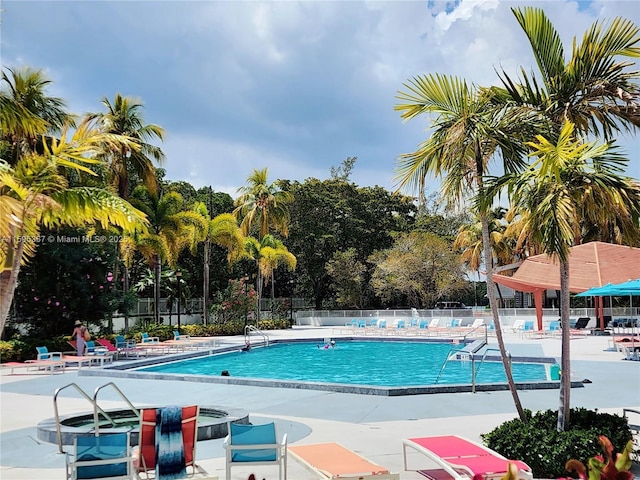 view of pool featuring a patio