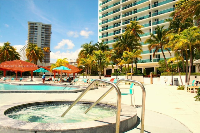 view of pool featuring a community hot tub