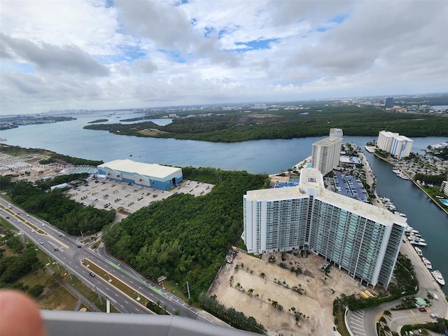 birds eye view of property featuring a water view