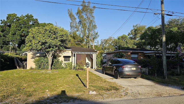 view of front of home with a front lawn