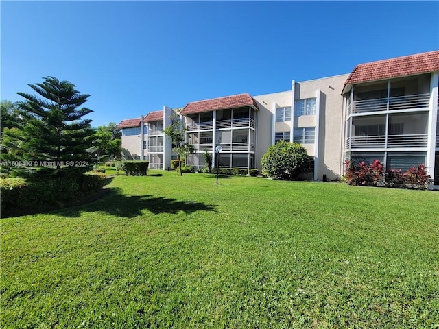 exterior space with a lawn