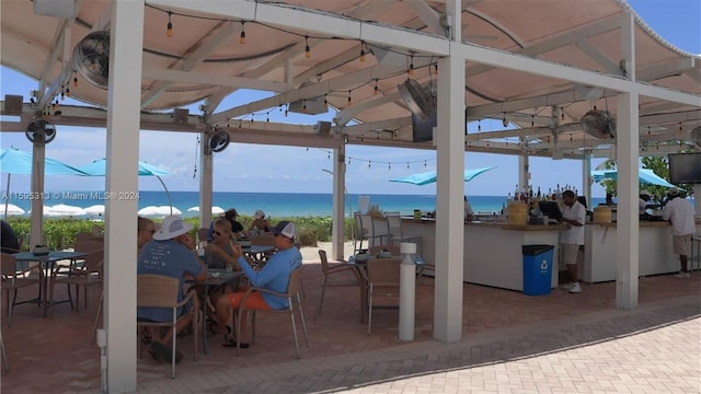 view of patio featuring exterior bar