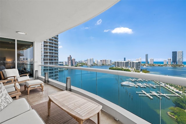 balcony featuring a water view