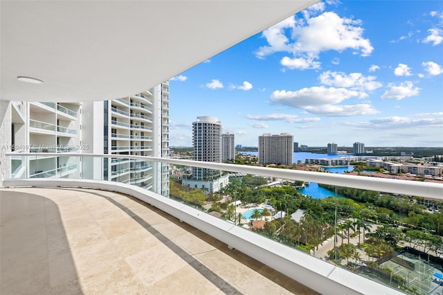 balcony featuring a water view