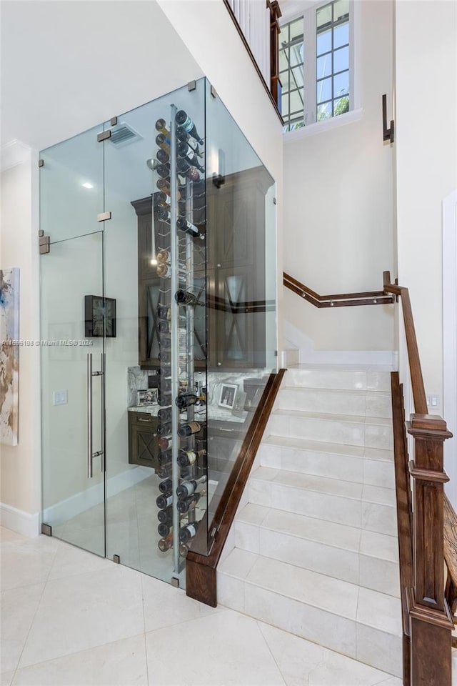 wine room with tile patterned flooring