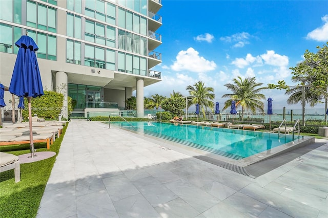 view of swimming pool featuring a patio