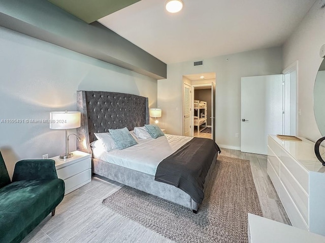 bedroom featuring light hardwood / wood-style flooring