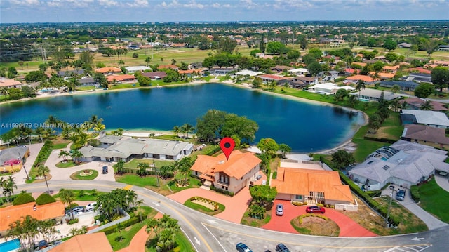 drone / aerial view featuring a water view