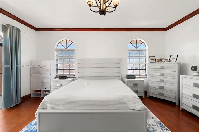 bedroom with dark wood-type flooring, crown molding, and multiple windows