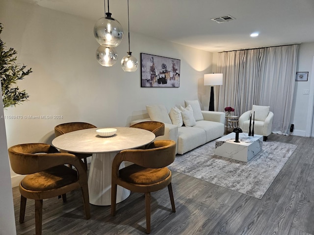 living room with dark hardwood / wood-style floors