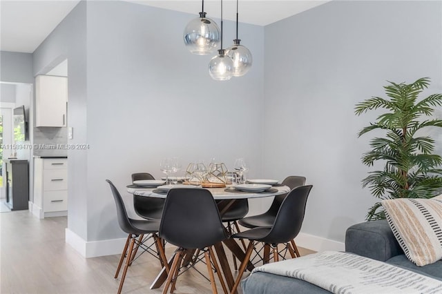 dining room featuring light hardwood / wood-style flooring