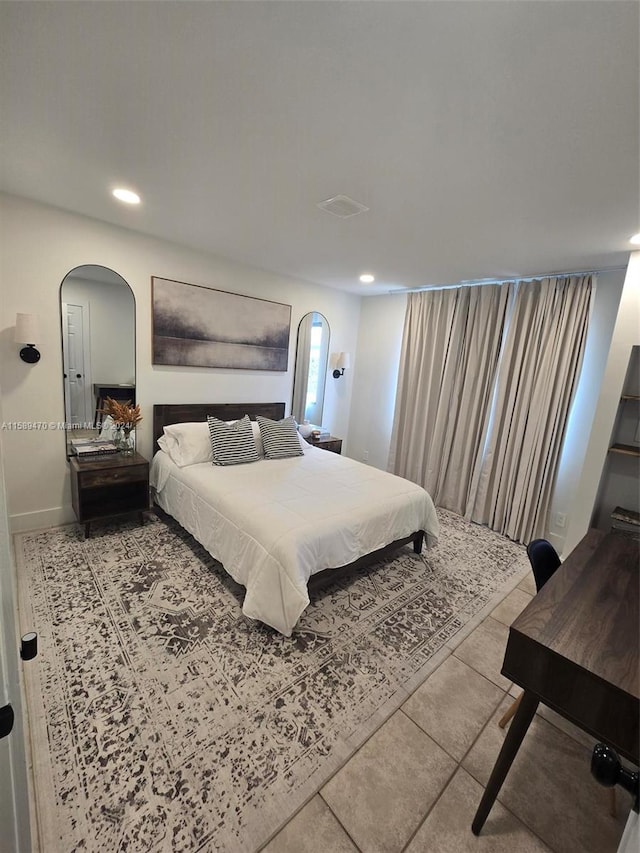 bedroom with tile patterned flooring