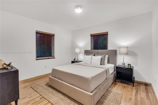 bedroom with light hardwood / wood-style floors