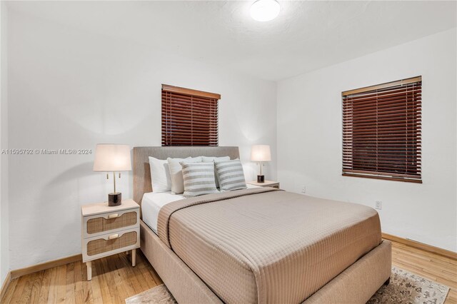 bedroom featuring hardwood / wood-style floors