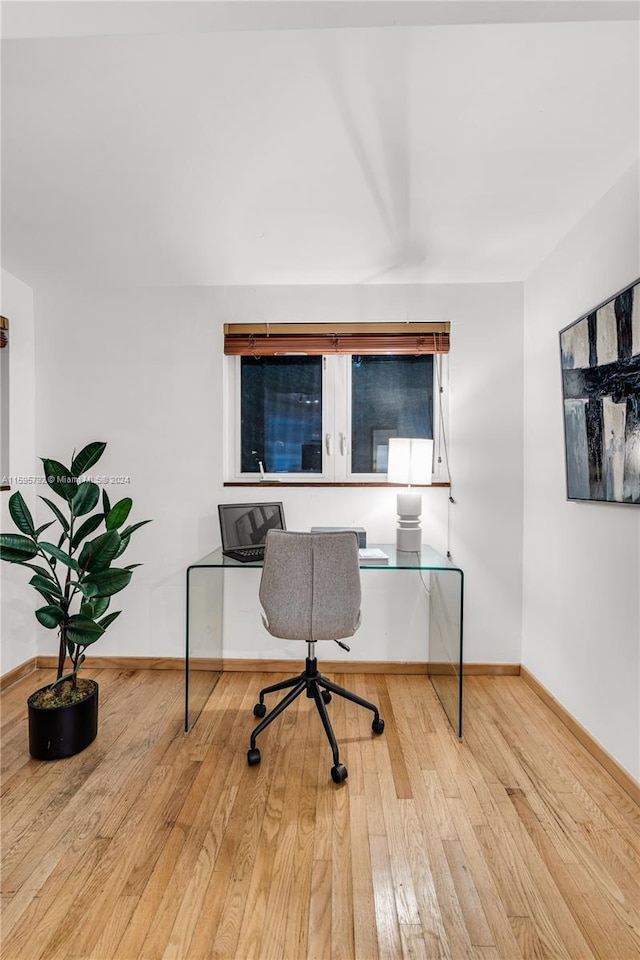 home office featuring light hardwood / wood-style flooring