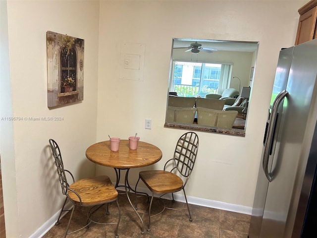 dining space with ceiling fan