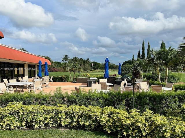 view of community with a patio area