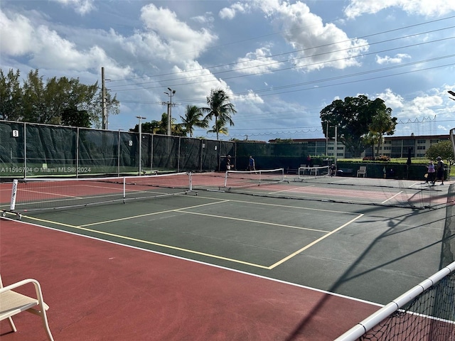 view of sport court with basketball hoop