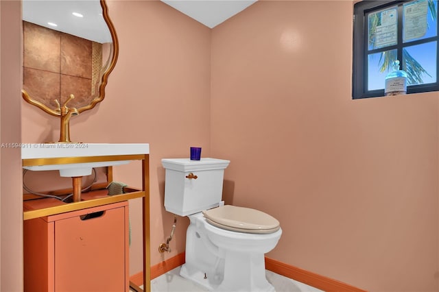 bathroom featuring toilet