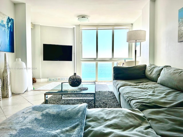 living room featuring light tile floors