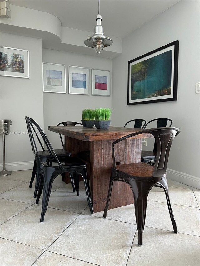 dining space with baseboards