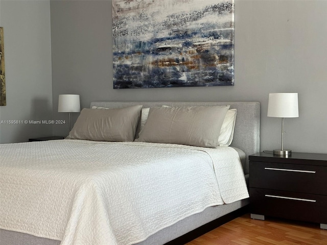 bedroom featuring wood finished floors