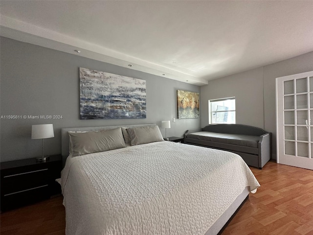 bedroom with wood-type flooring