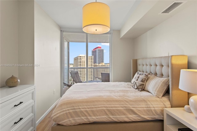 bedroom featuring light hardwood / wood-style floors