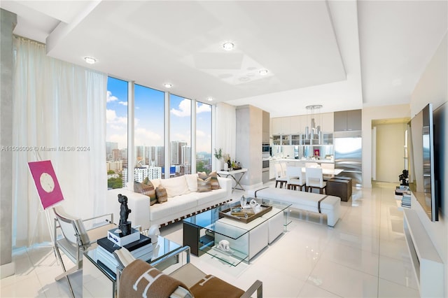 tiled living room with floor to ceiling windows