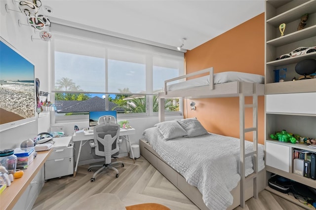 bedroom featuring light wood-type flooring