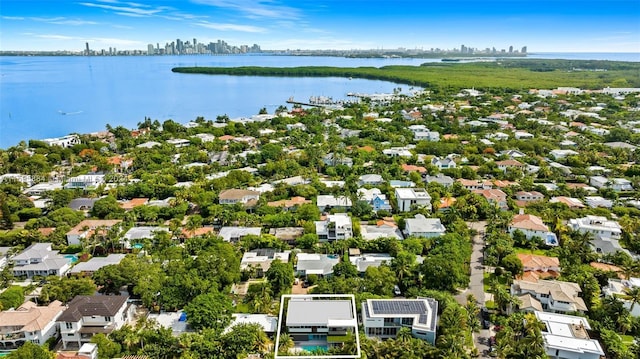 bird's eye view with a water view