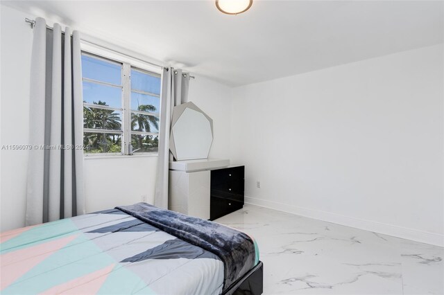 bedroom with tile flooring