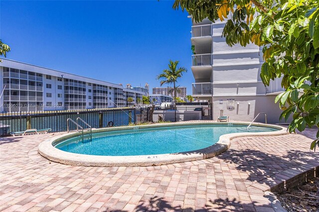 view of pool featuring a patio area