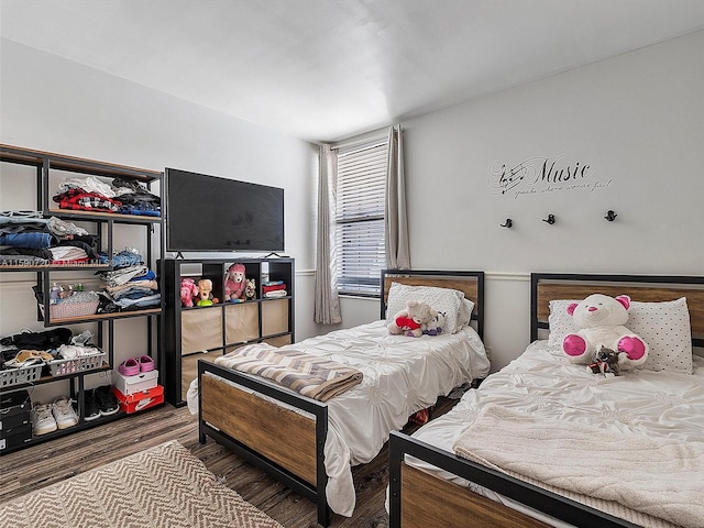 bedroom with wood-type flooring