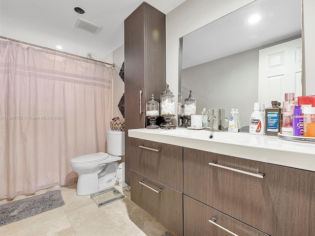 bathroom featuring vanity, toilet, and a shower with shower curtain