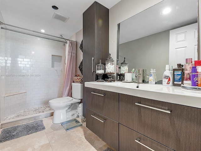 bathroom with a shower with shower curtain, toilet, and vanity