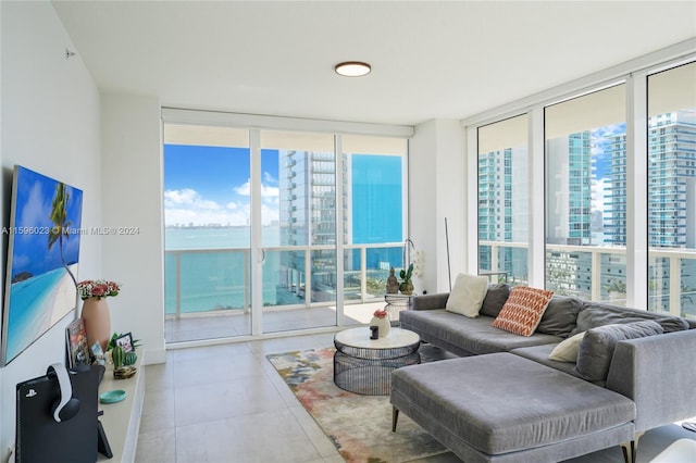 living room featuring floor to ceiling windows