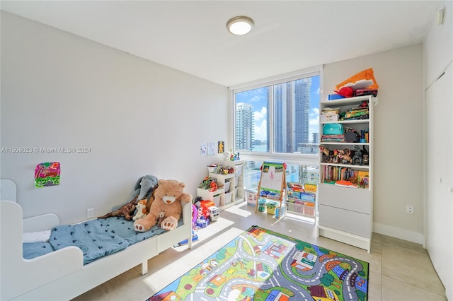 bedroom featuring tile patterned floors