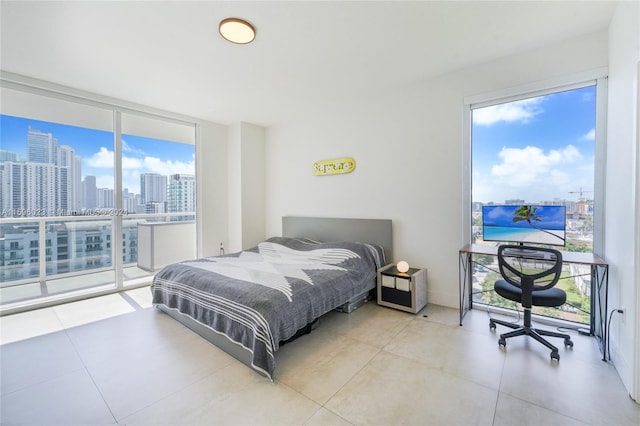 bedroom featuring expansive windows